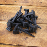 Handmade cut clasp nails in a forge blackened finish - ABC Ironmongery