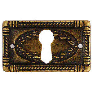 Continental style escutcheon 1¾" x 1" in antique brass - ABC Ironmongery